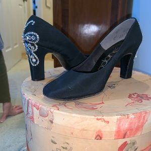 Black file leather sole heels